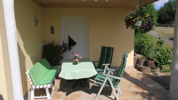 Cozy terrace in front of the apartment