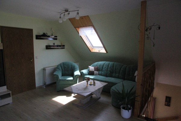 Cozy sofas and chairs in front of a coffee table